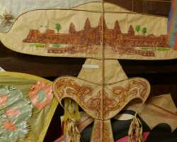 You can see kites from India with a photograph of a Hindu deity, a Chinese dragon shape, Thailand kite which shows a child was born who keep the evil 